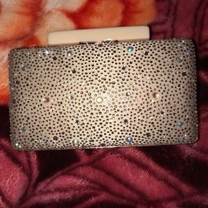 A clutch purse